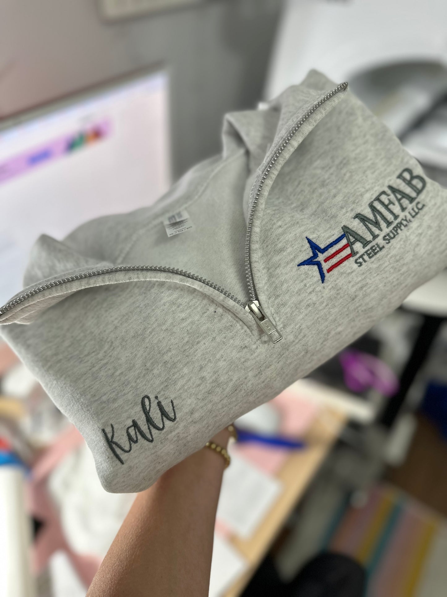 Embroidered Quarter Zip Sweatshirt