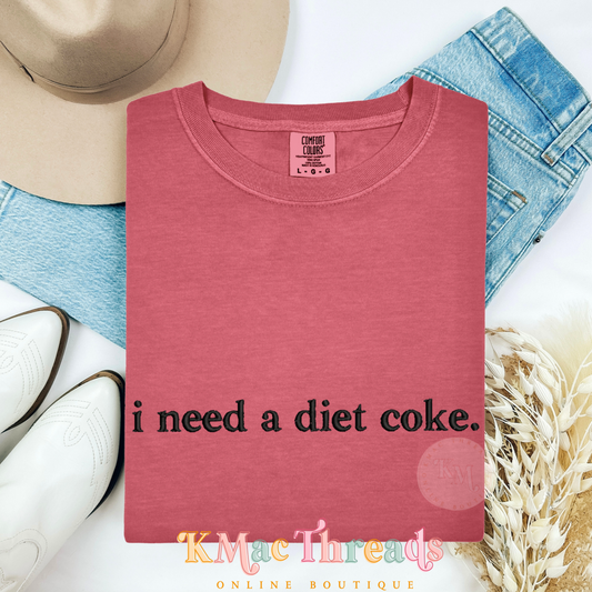 Embroidered “I need a soda.”