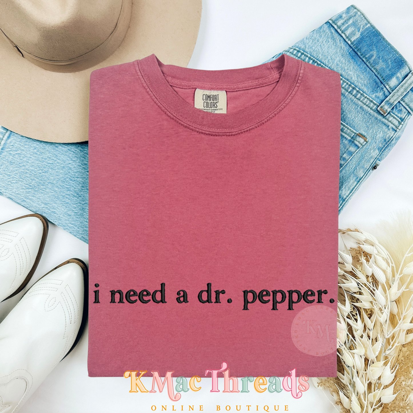 Embroidered “I need a soda.”