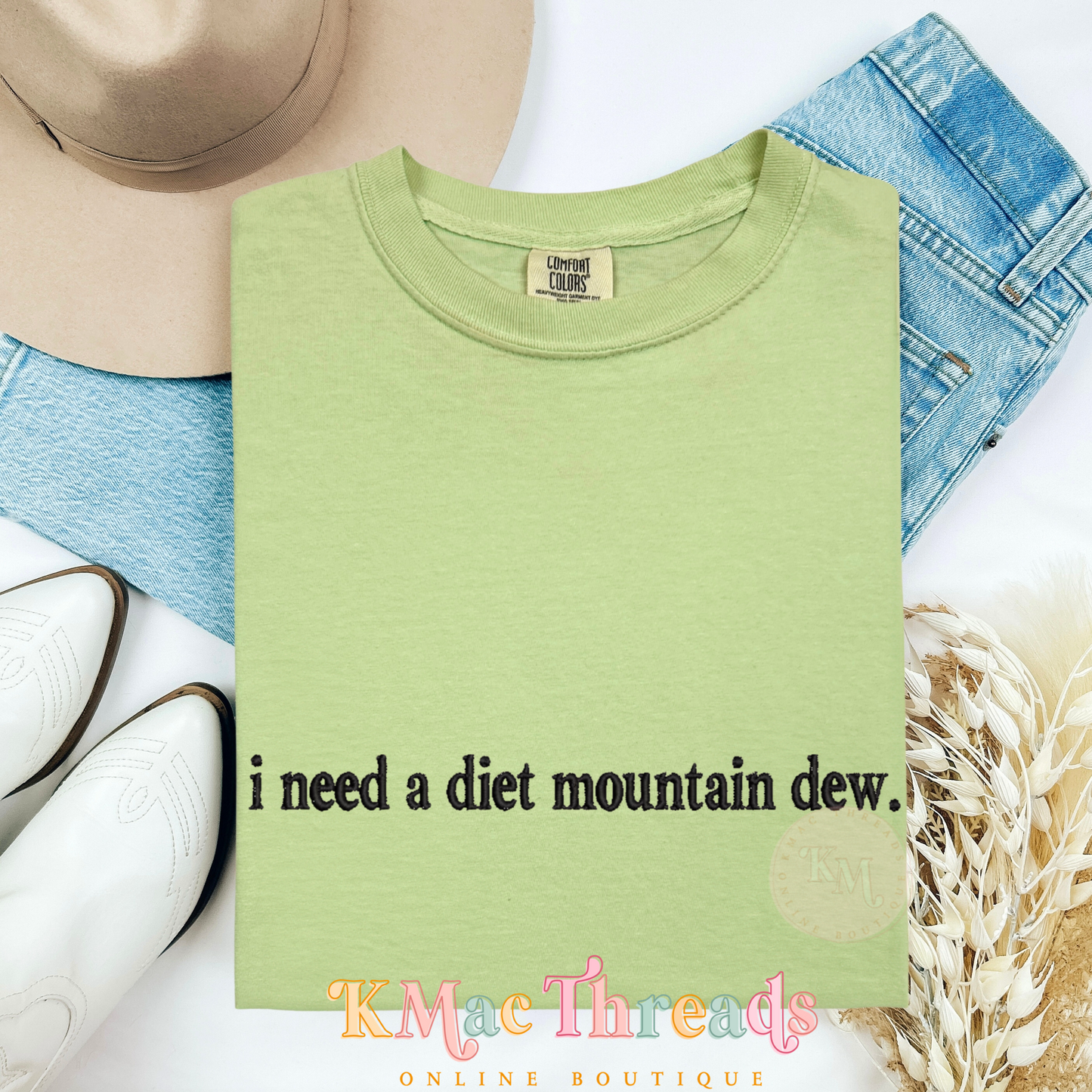 Embroidered “I need a soda.”