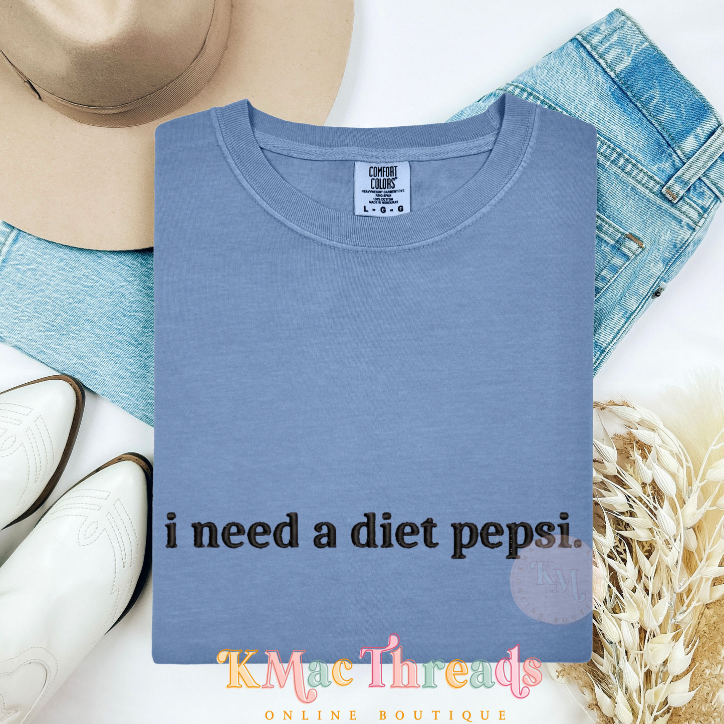 Embroidered “I need a soda.”