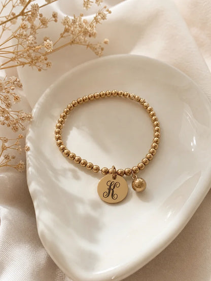 Engraved Beaded Stretch Bracelet With Charm
